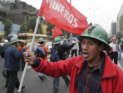 Peruvian mining workers protest in the streets of downtown Lima July 3, 2008. 